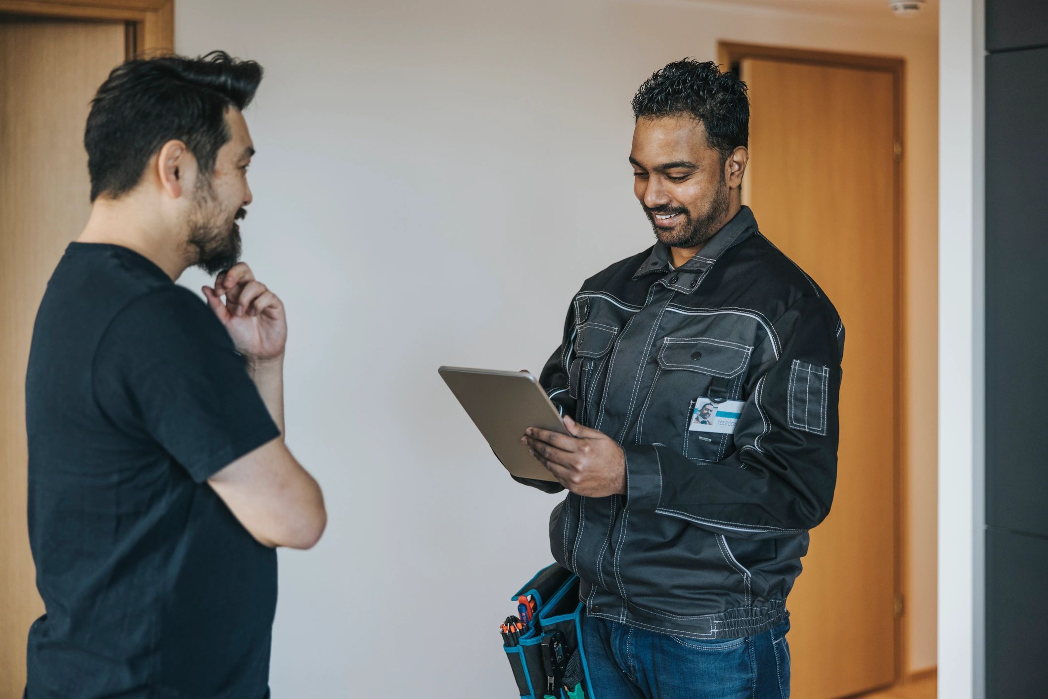 handyman talking to homeowner